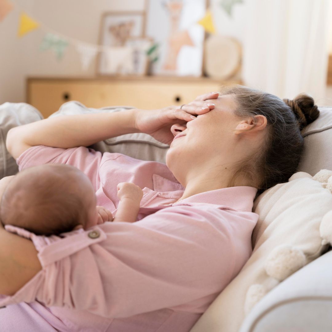 Mother and baby sharing a comforting moment in a peaceful, nurturing room