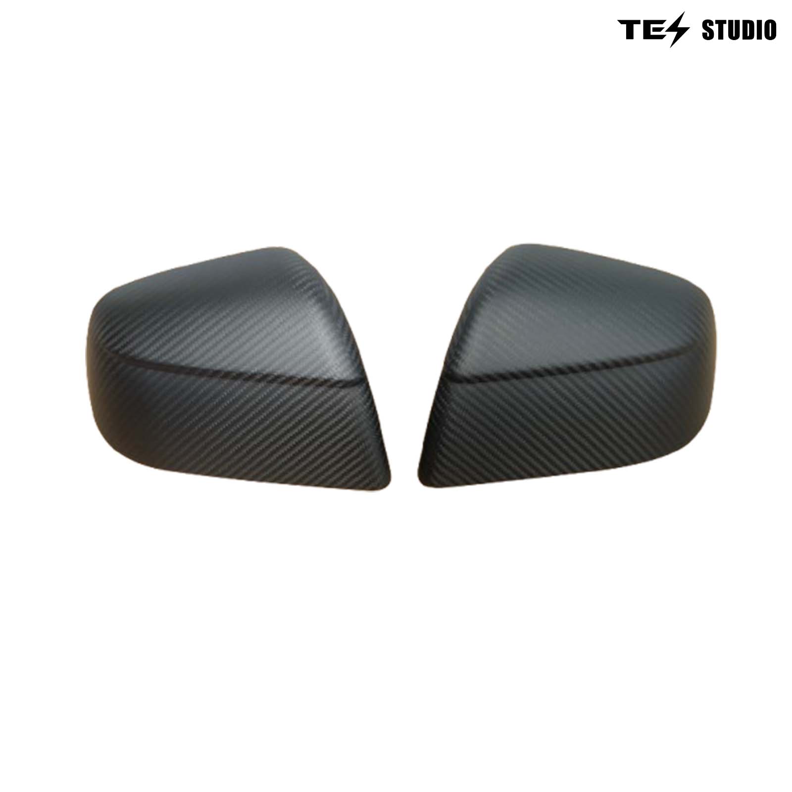 Carbon fiber Tesla accessories with TES STUDIO side mirrors, high-tech matte finish.