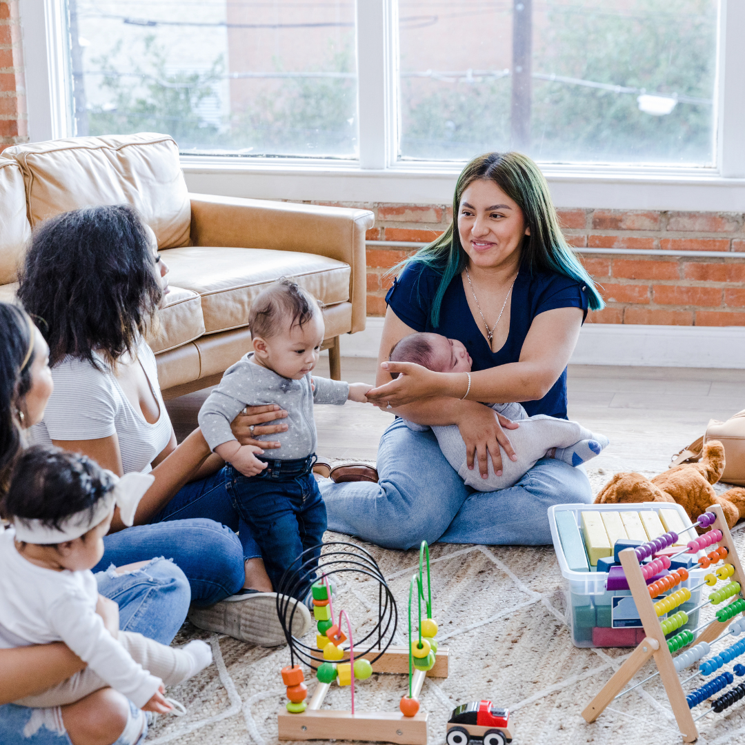 group enjoying conversation in a cozy setting with noise-cancelling technology