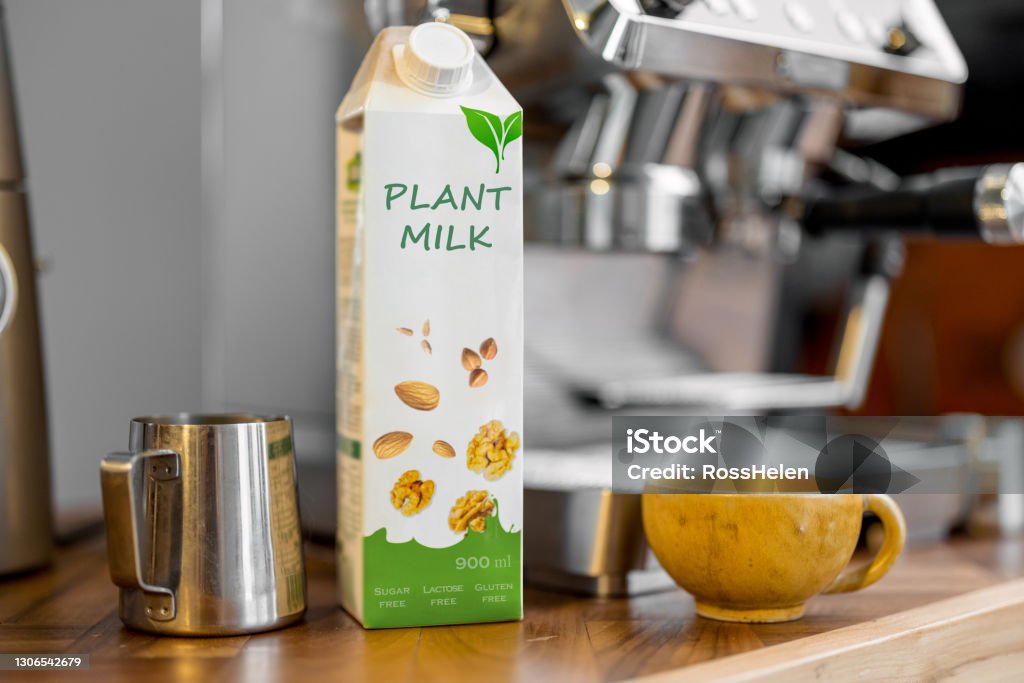 plant milk carton on kitchen counter with coffee pot and mug, ideal baby formula alternative