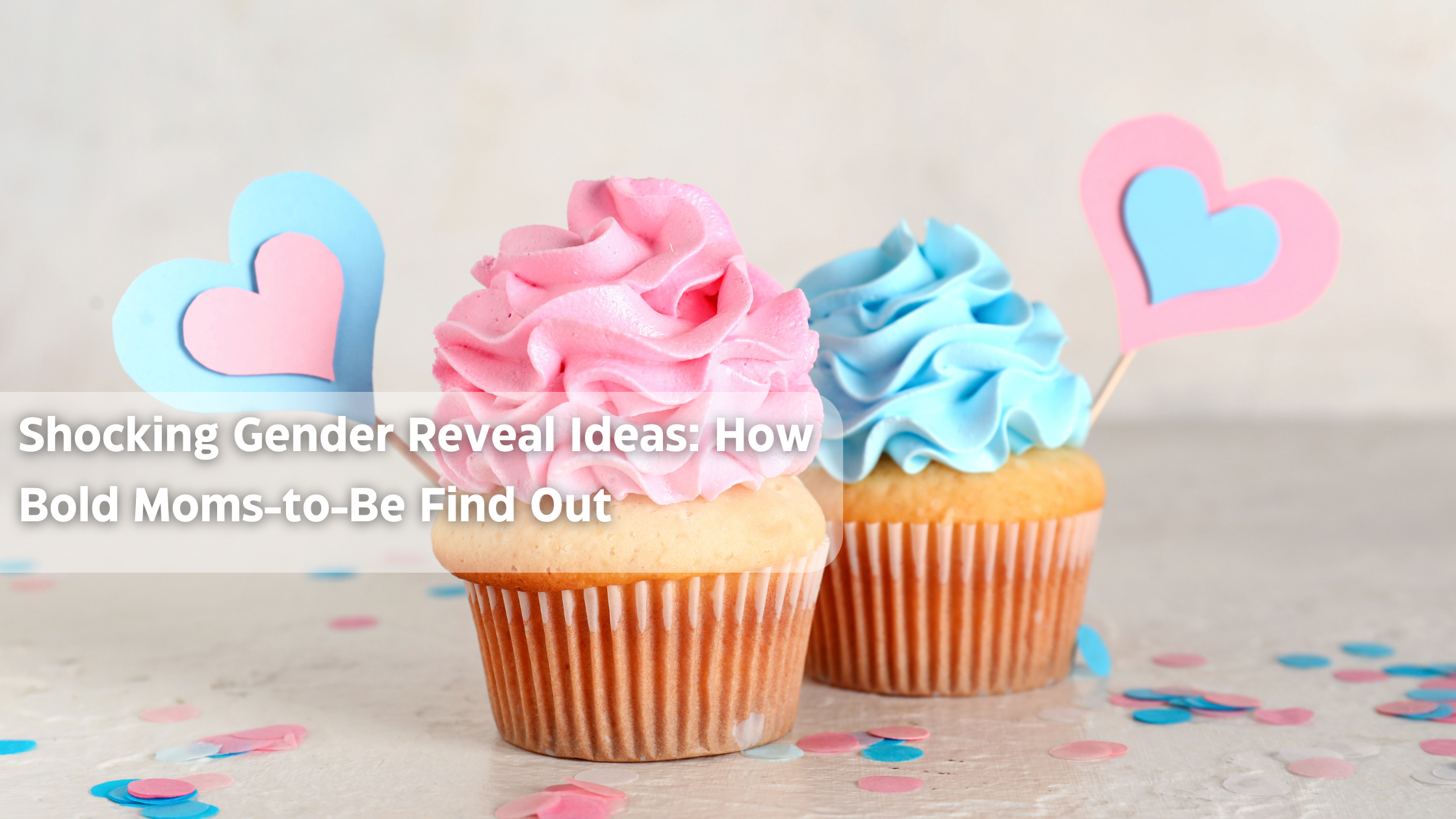 Cupcakes for gender reveal with pink and blue frosting and heart cutouts.